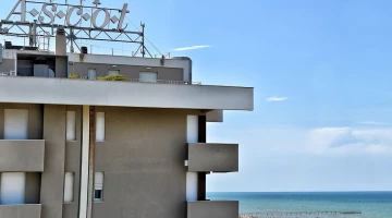 The hotel overlooks the sea, close to the beach