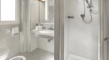 Spacious bathroom with shower box, in apartment
