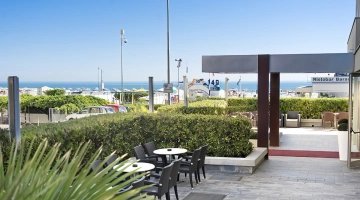 Garden terrace furnished with lounges and a splendid view