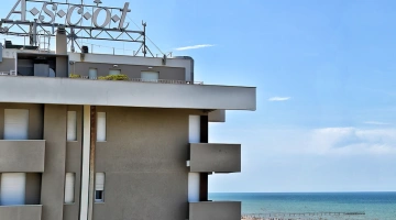 The hotel overlooks the sea, close to the beach