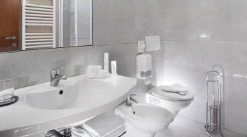 The bathroom with a comfortable shower box