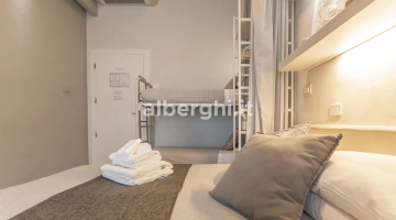 Camera quadrupla deluxe